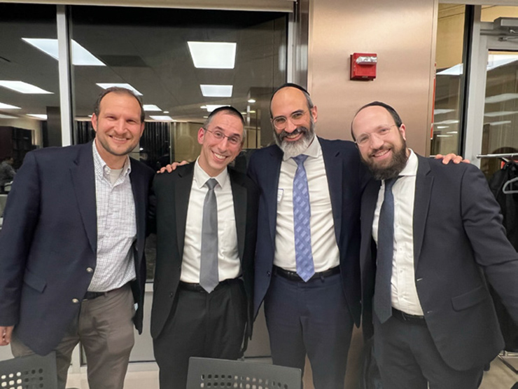 Jewish men posing for photo at Margaret Tietz