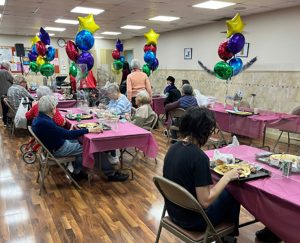 These images capture the essence of Chanukah at Margaret Tietz, where our seniors come together to celebrate and share the joy.