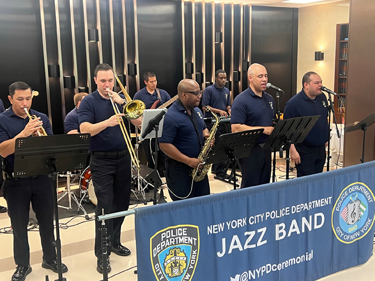 The NYPD Jazz band playing multiple instruments