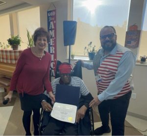 Air Force veteran Franklin Martin is thanked by Linda Spiegel and Ricardo Sola.